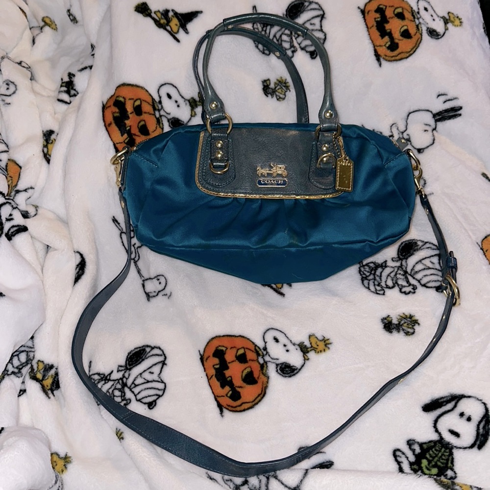 Teal coach purse